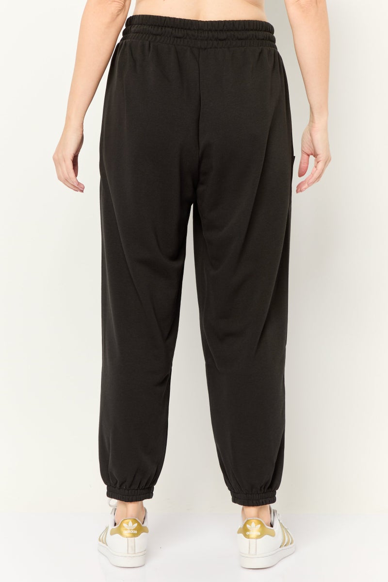 PUMA Women Relaxed  Fit  Outdoor Sweatpants, Black - Image 4