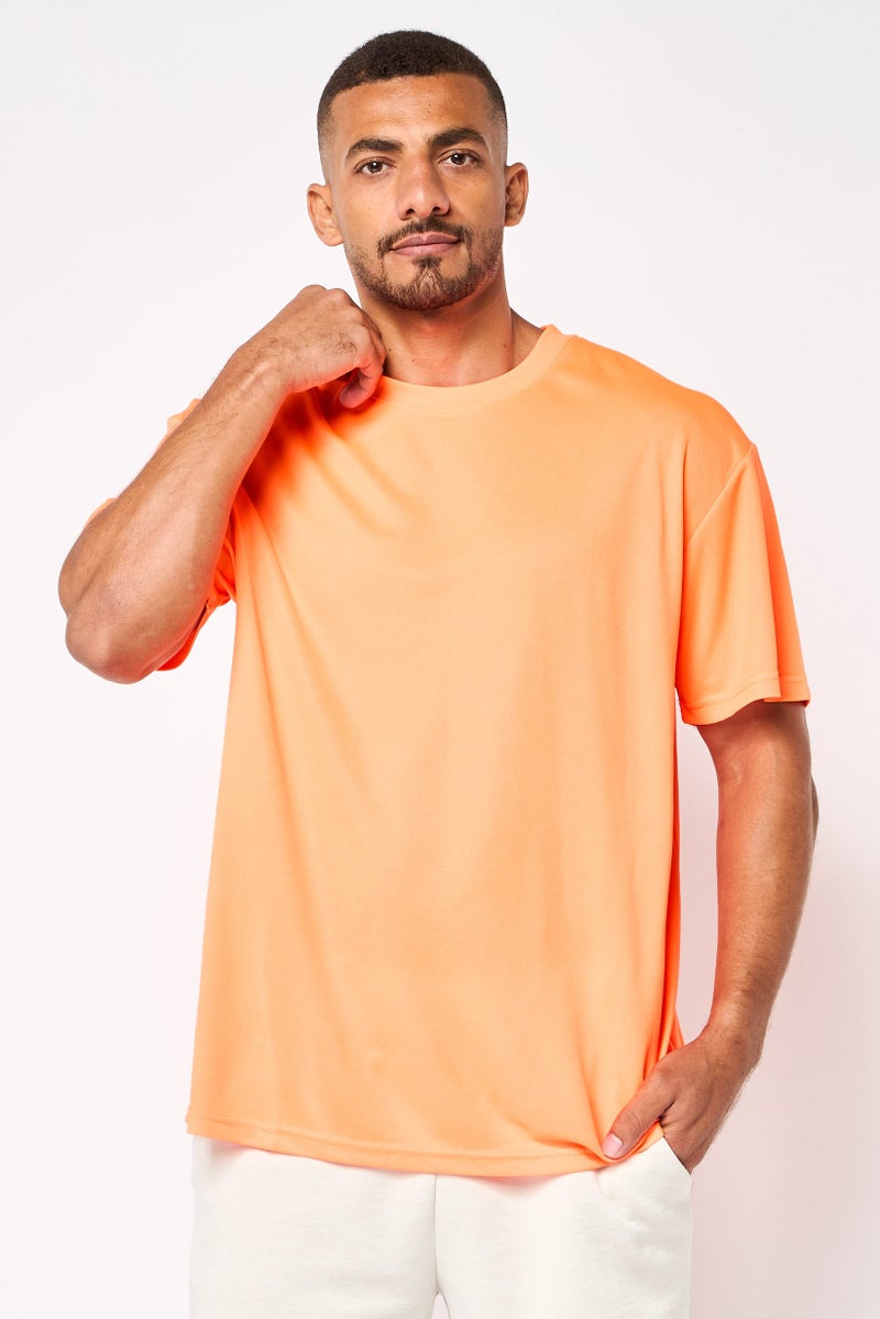 FILA Men Sportswear Fit Short Sleeve Training T-Shirt, Orange - Image 1