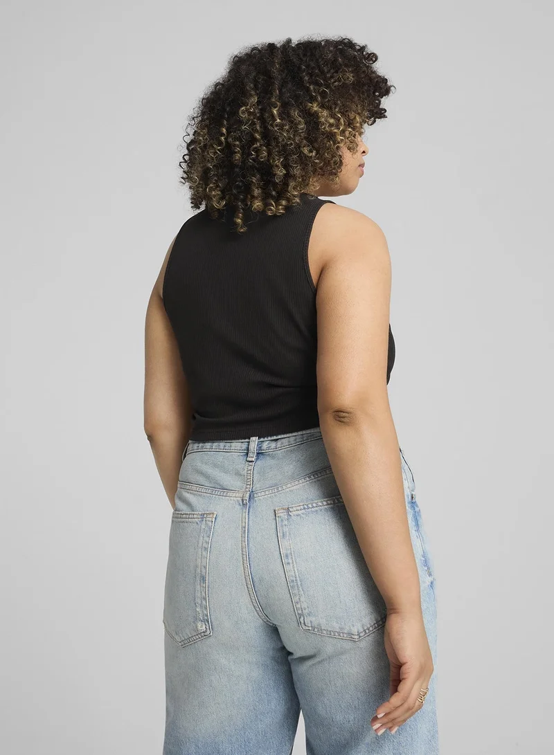 PUMA Wardrobe Essential Ribbed Cropped T-Shirt