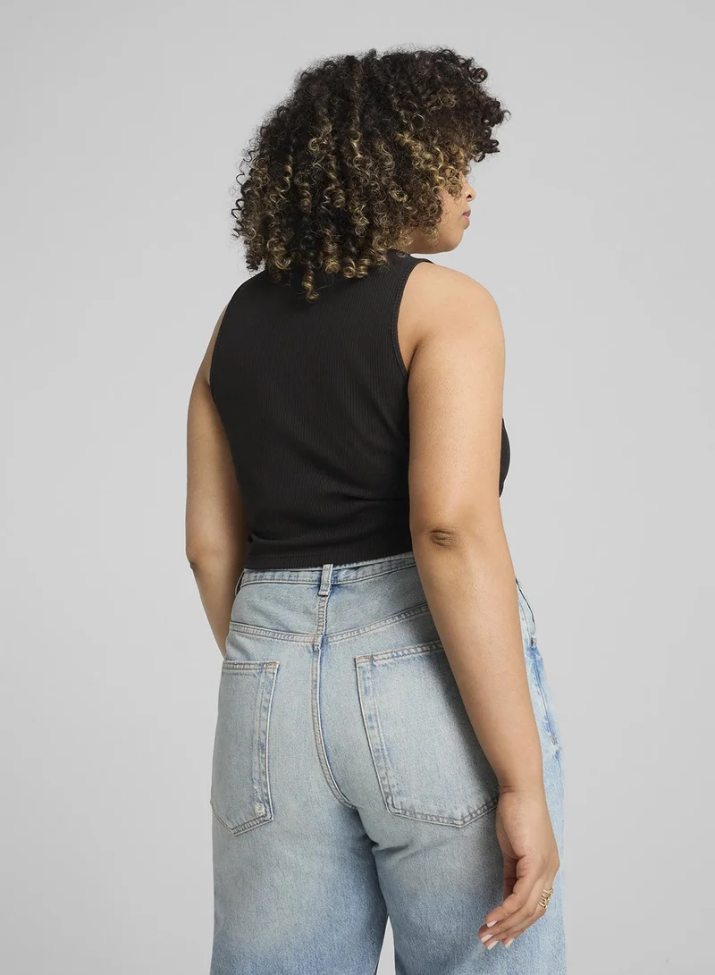 PUMA Wardrobe Essential Ribbed Cropped T-Shirt