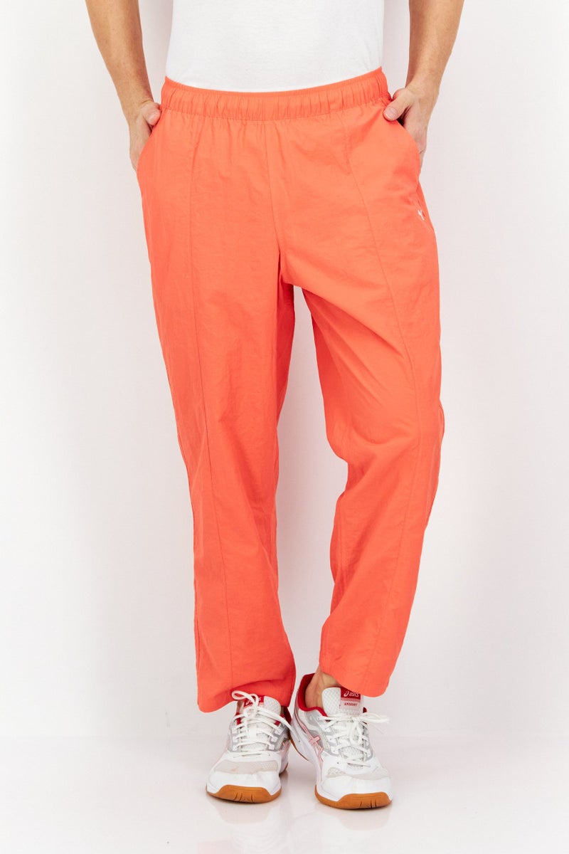 PUMA سروال رياضي خارجي للرجال، كورال - Image 1