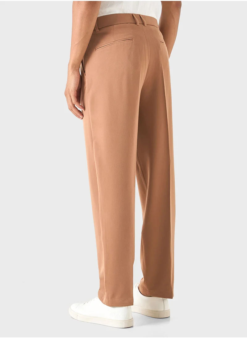 ايكونيك Iconic Solid Pants with Button Closure and Pockets