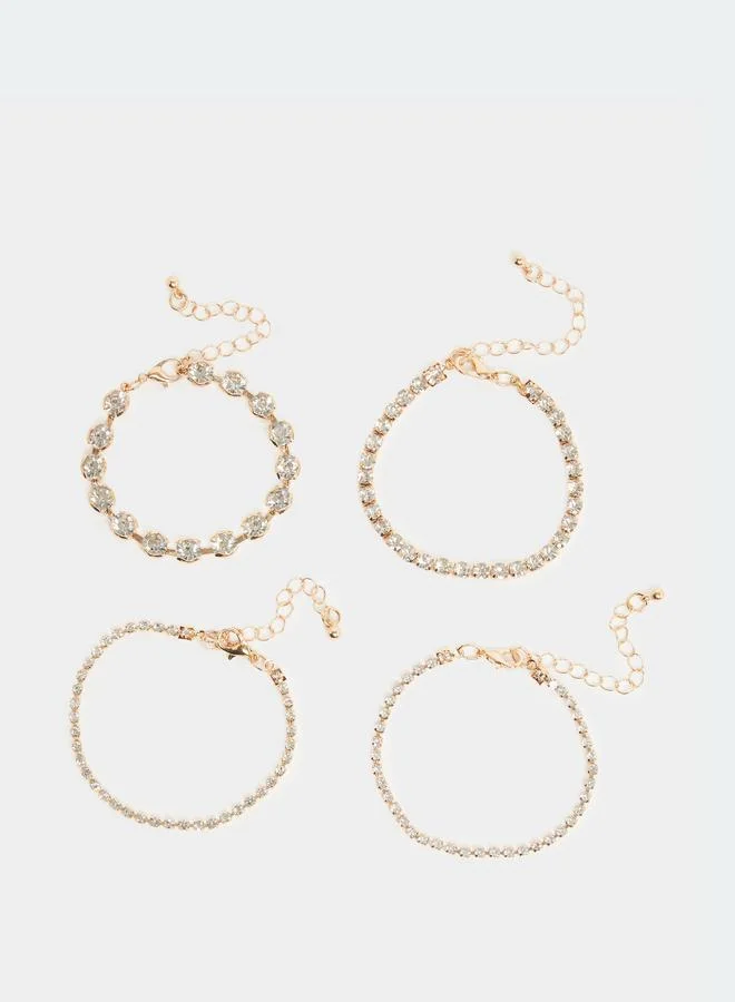 ستايلي طقم 4 أساور مزينة باللون الذهبي
