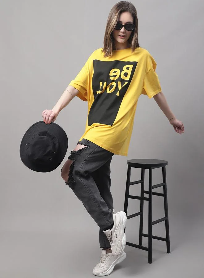 تايك تو تيشيرت نسائي أصفر مطبوع برسومات كبيرة من دور