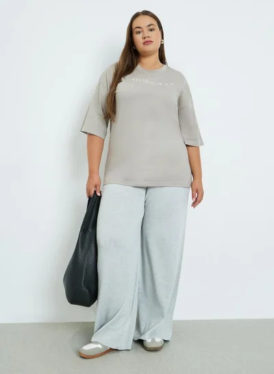 Styli Plus Size Grey Flared Trousers