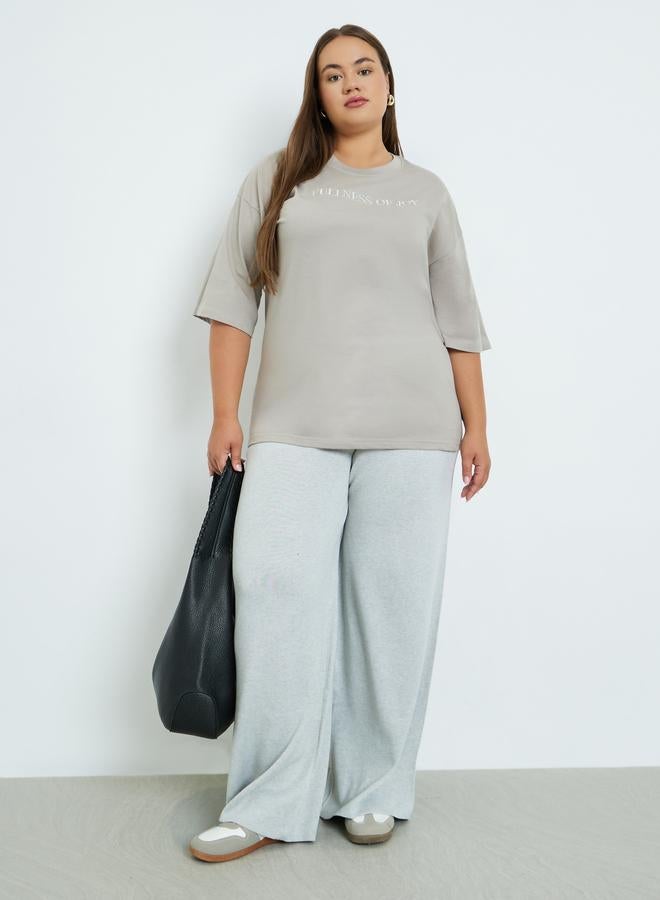 Styli Plus Size Grey Flared Trousers - Image 1