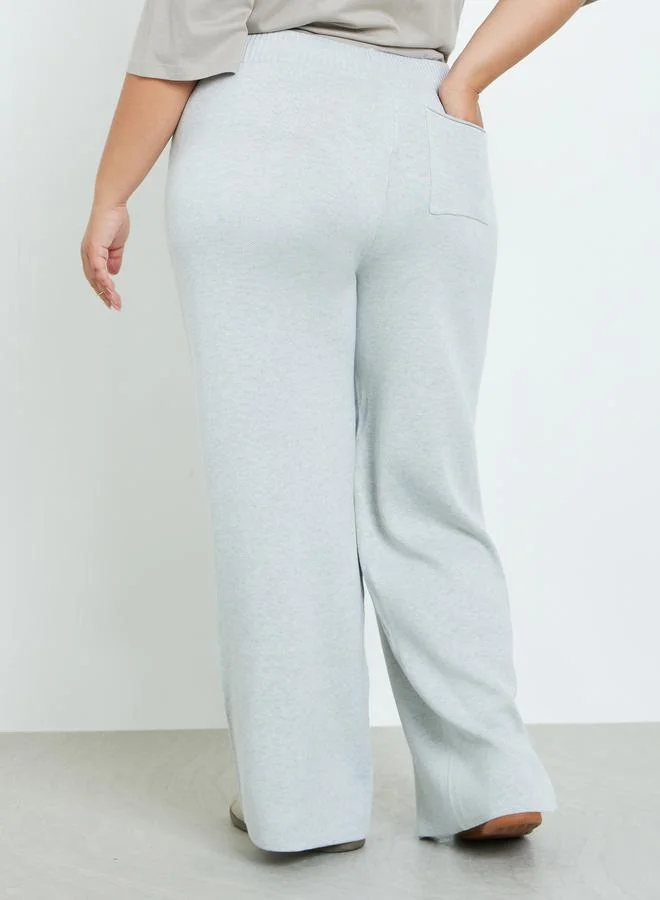 Styli Plus Size Grey Flared Trousers