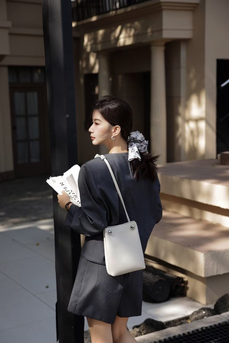 2025 Luojia New Calfskin Shoulder Bag Pebble Hobo Mini Bucket Bag Drawstring Crossbody Phone Bag - Image 1