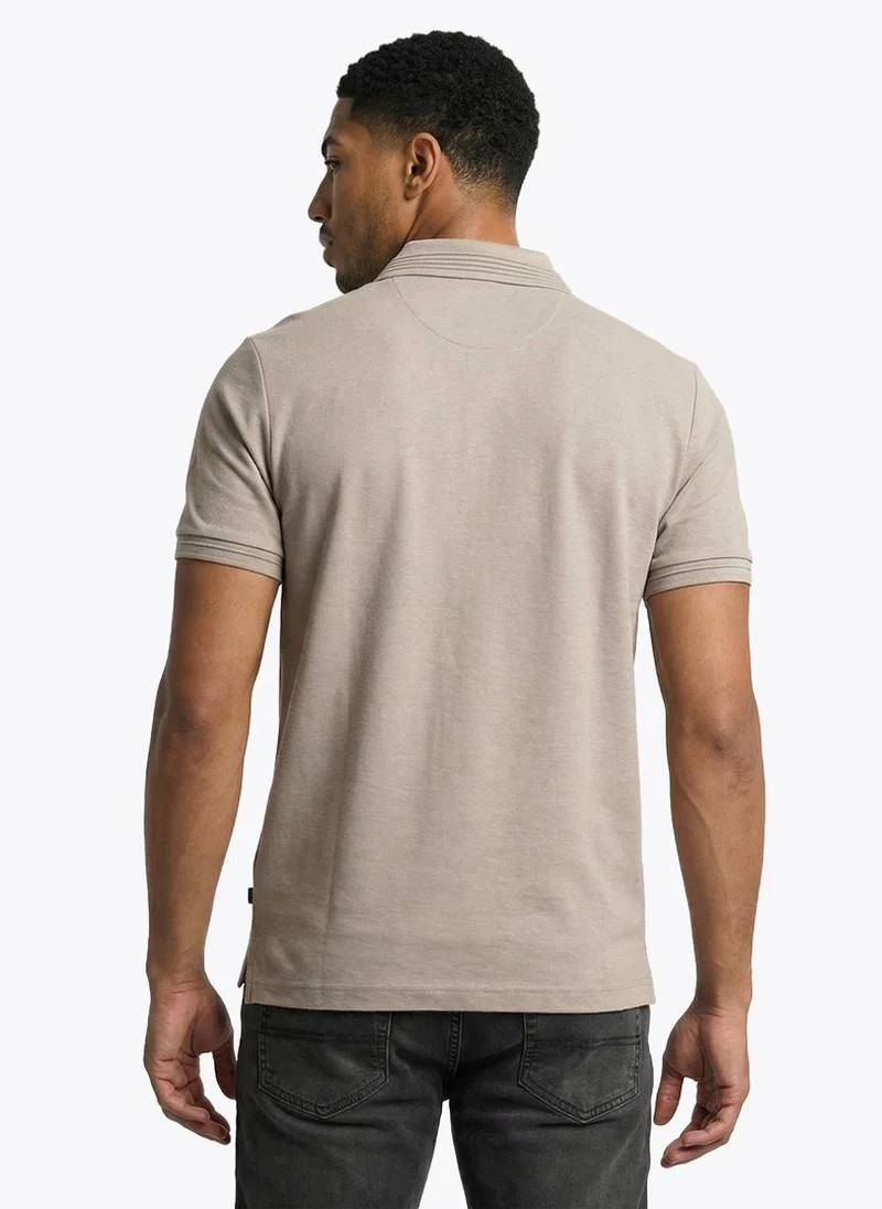 Nautica Men Regular Fit Short Sleeve Logo Polo Shirt for Casual Styling - Beige