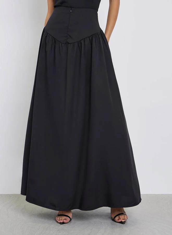 ستايلي تنورة طويلة بحافة واسعة وخصر عريض
