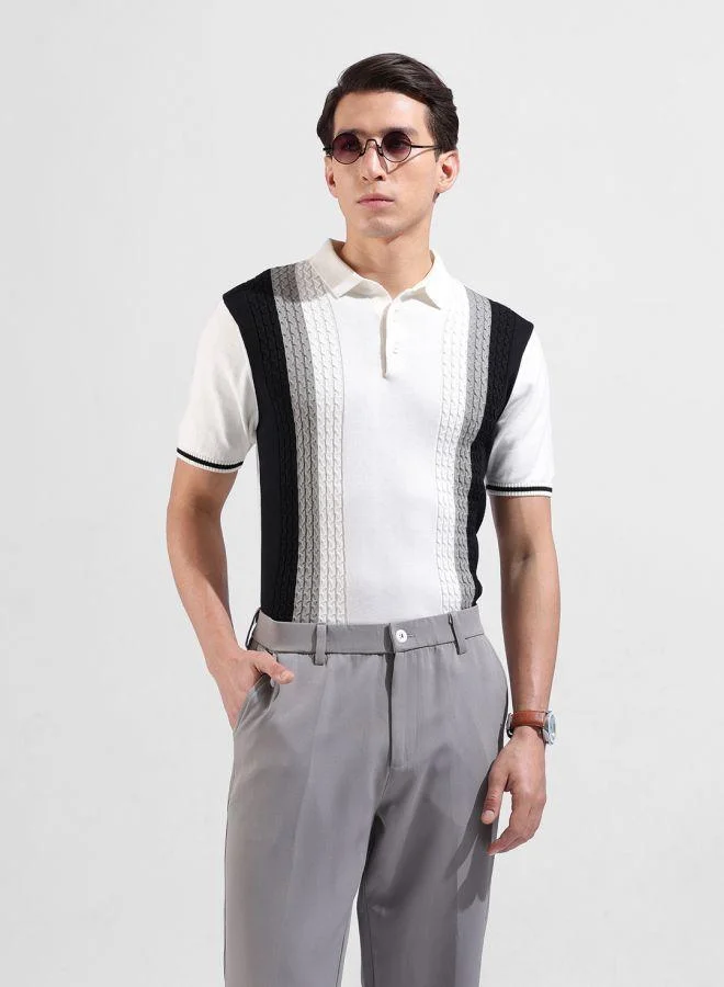 شركة المرآب الهندية Men Slim Fit Textured Polo Neck Half Sleeves T-Shirt