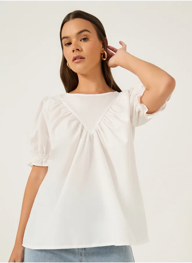 ستايلي Solid Puff Sleeves Top with Smocked Cuffs