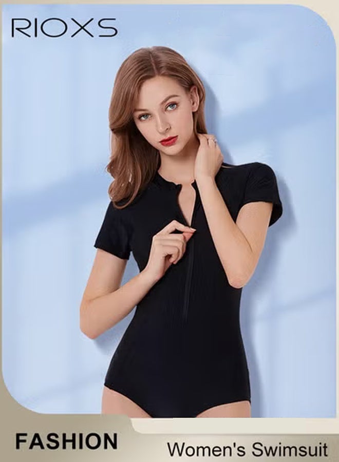ريوكس ملابس سباحة نسائية من قطعة واحدة، ملابس سباحة محتشمة بغطاء رأس وقفل سحابي لحماية من الأشعة فوق البنفسجية، ملابس سباحة عصرية بأكمام قصيرة وسحاب أمامي مصنوعة من قماش عالي الكثافة وسريع الجفاف، ملابس سباحة مريحة ومطاطية بأكمام قصيرة مناسبة لركوب الأمواج والغوص والسباحة أو الأنشطة الشاطئية، لون أسود - Image 1
