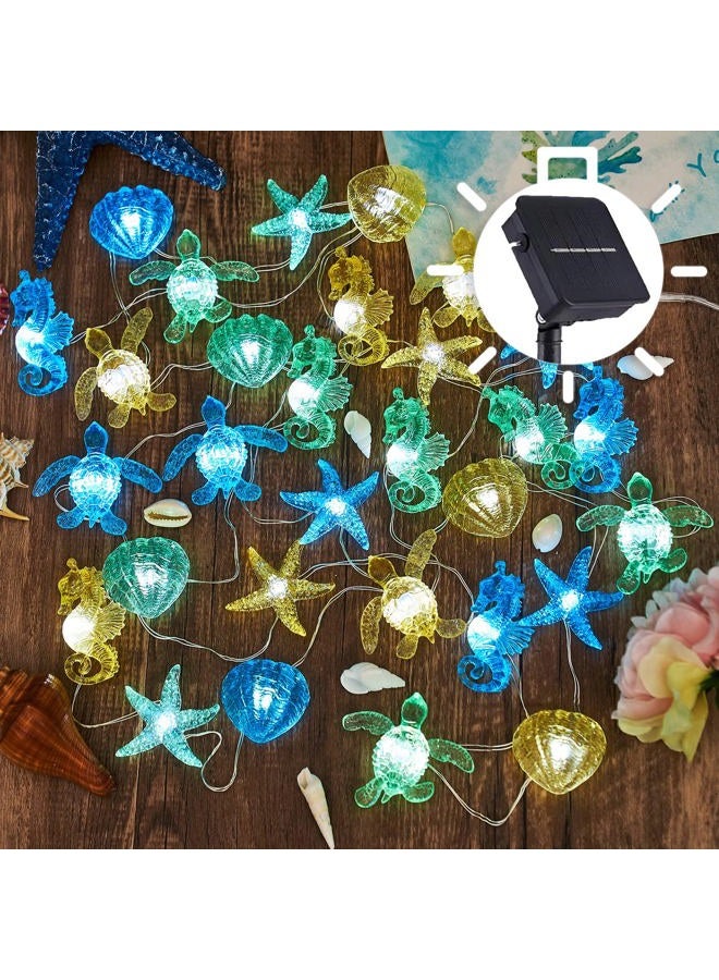 JASHIKA Coastal Solar String Lights Outdoor Garden Lights Marine Life Solar Fairy Garden Lights for Outside 14ft 40LED Waterproof Turtle Seahorse Starfish Clam Beach House Nautical String Lights Yard Decor - Image 1