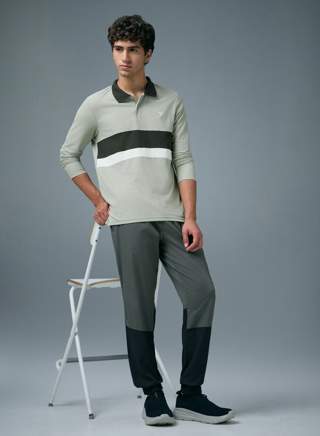 تكنوسبورت بولو بقصة ضيقة وتفاصيل متباينة - Image 4