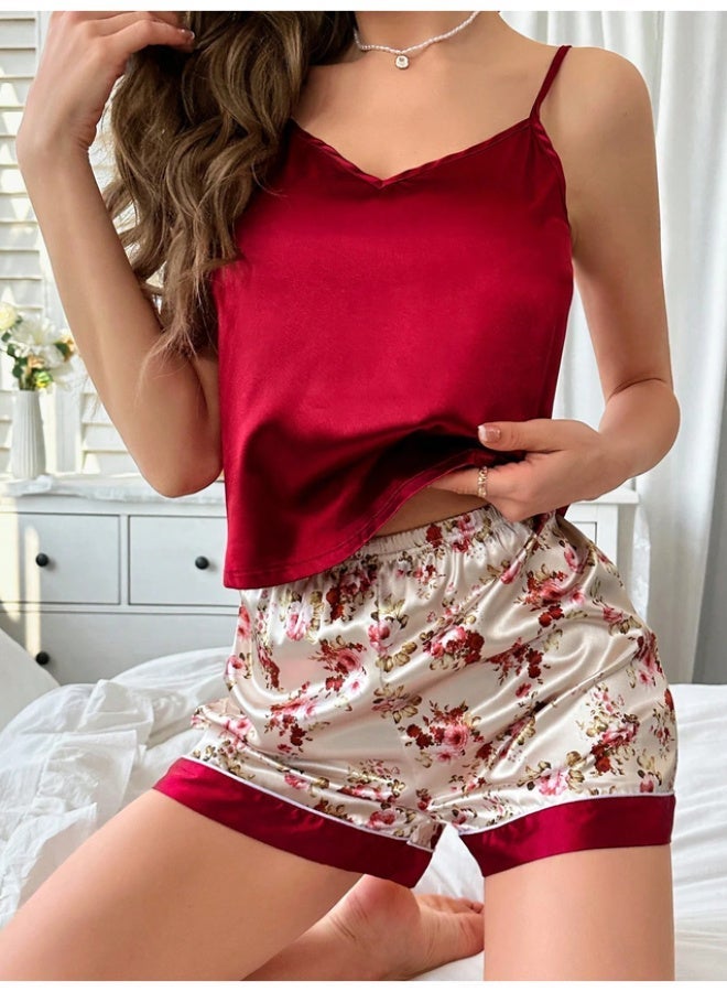 Pajama set consisting of a solid satin cami top and floral-print shorts. - Image 4