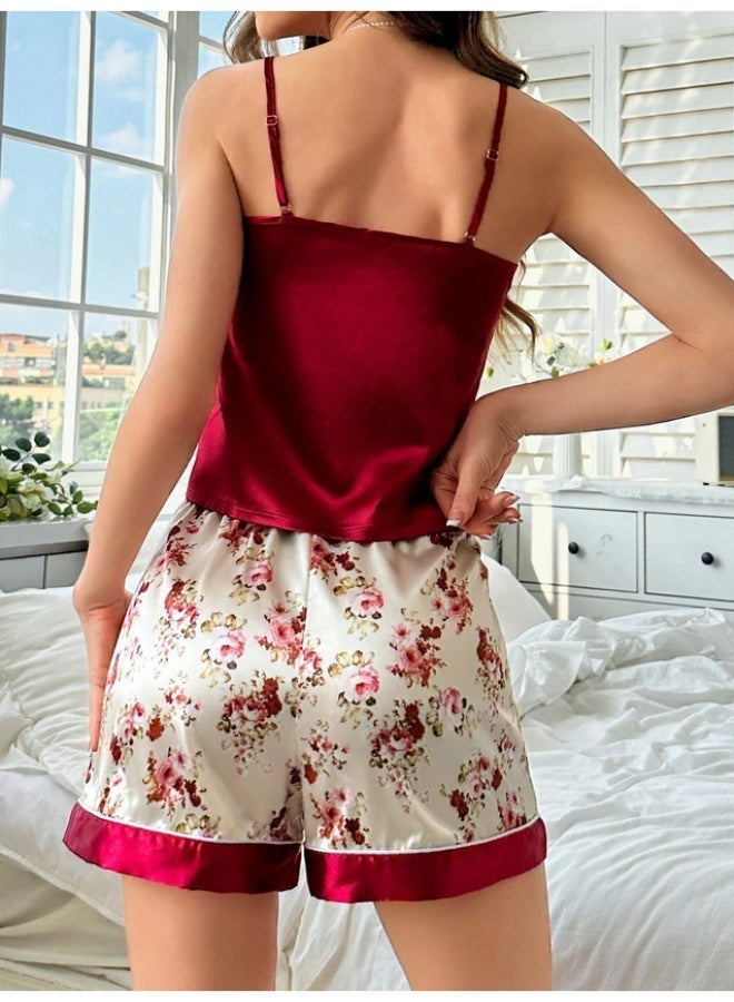 Pajama set consisting of a solid satin cami top and floral-print shorts. - Image 3