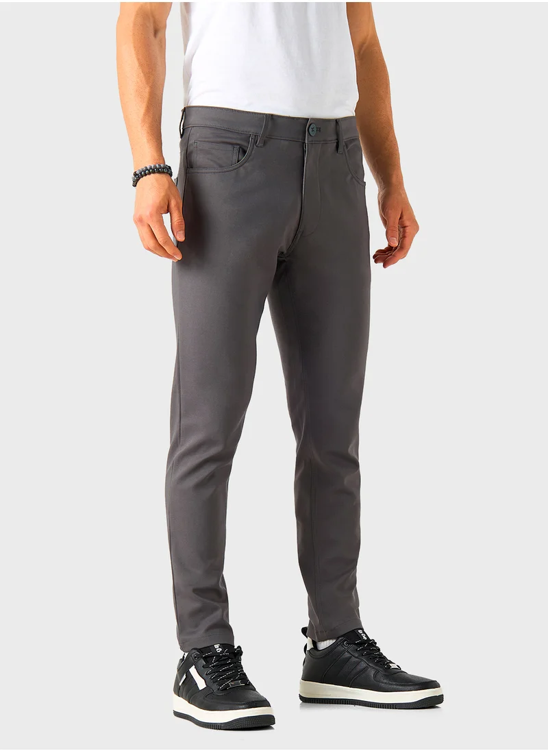 ايكونيك Iconic Solid Slim Fit Pants with Pockets