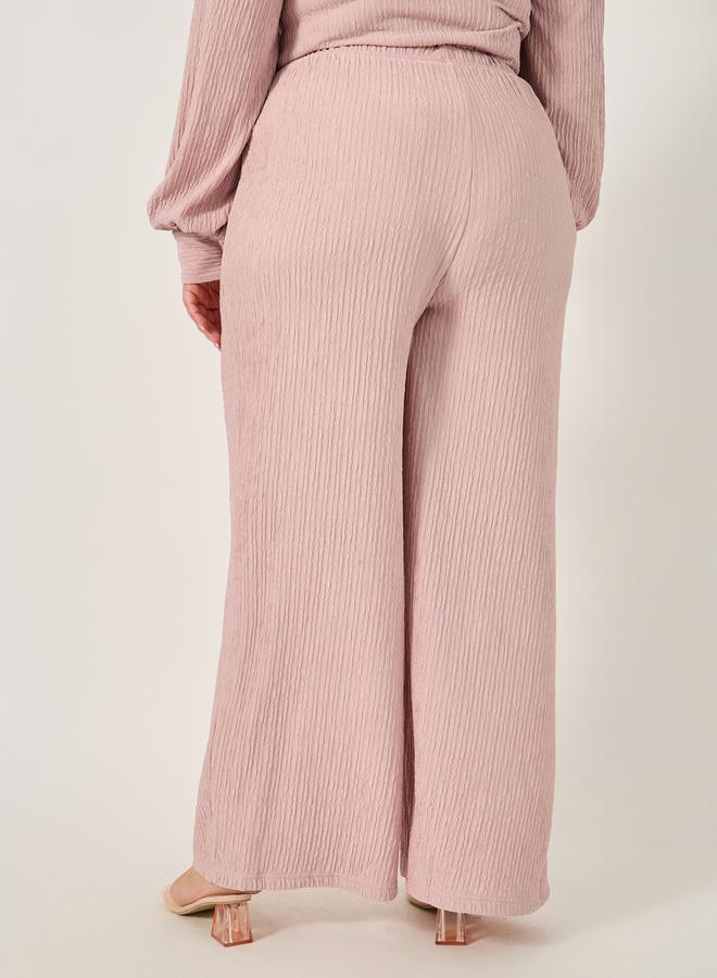 ستايلي بنطلون واسع الساق بنقوش بارزة بمقاس كبير - Image 4