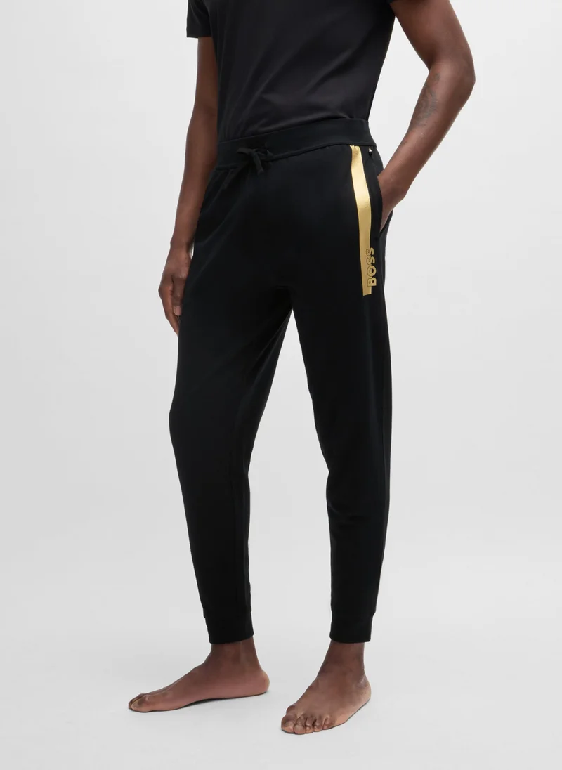 BOSS Cotton-terry tracksuit bottoms with metallic logo