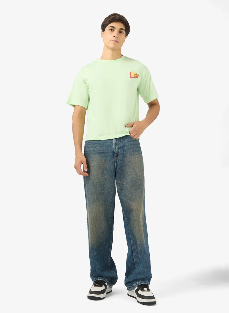 Seventy Five Green Graphic Oversized Boxy Fit T-Shirt for Men | Best Price UAE