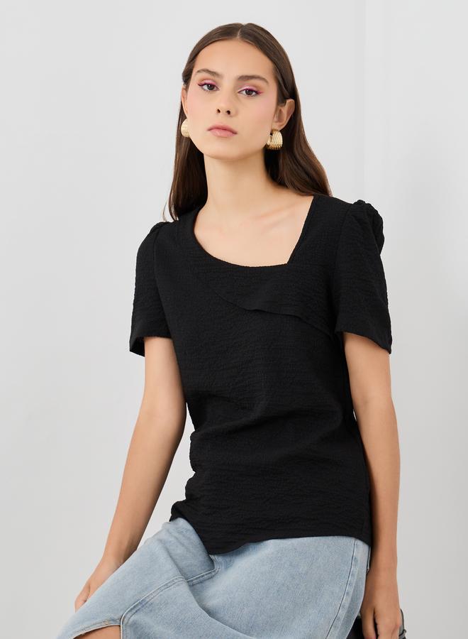 تايك تو توب بياقة غير متماثلة بلون سادة - Image 1