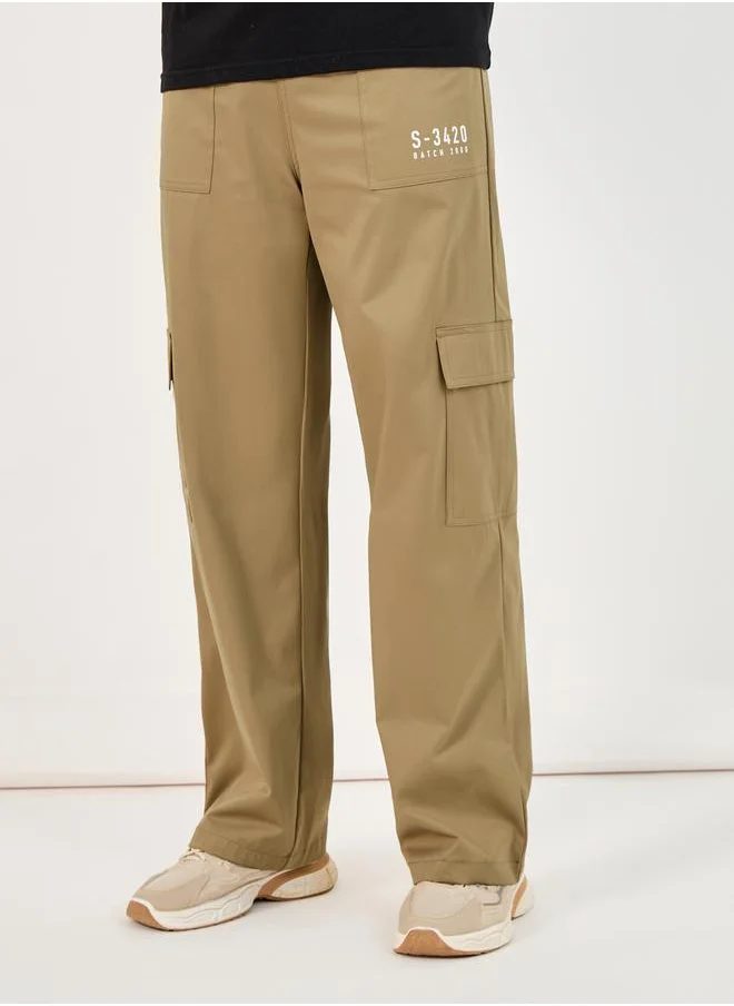 Styli Wide Leg Paneled Cargo Pants with Print Detail