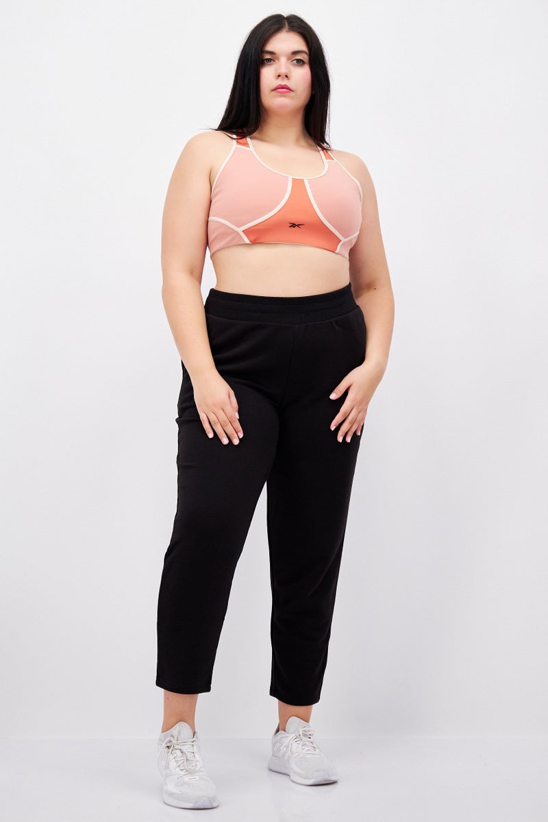 Reebok حمالة صدر رياضية مبطنة بسيطة للنساء، وردي فاتح - Image 2