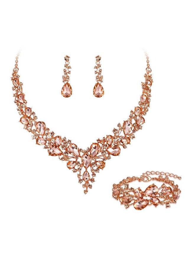 بريلوف مجموعة مجوهرات الزفاف النسائية من الكريستال النمساوي على شكل دمعة قلادة متدلية أقراط سوار وصلة لون الخوخ والذهب الوردي - Image 1
