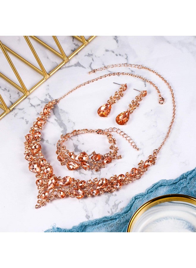 بريلوف مجموعة مجوهرات الزفاف النسائية من الكريستال النمساوي على شكل دمعة قلادة متدلية أقراط سوار وصلة لون الخوخ والذهب الوردي - Image 3