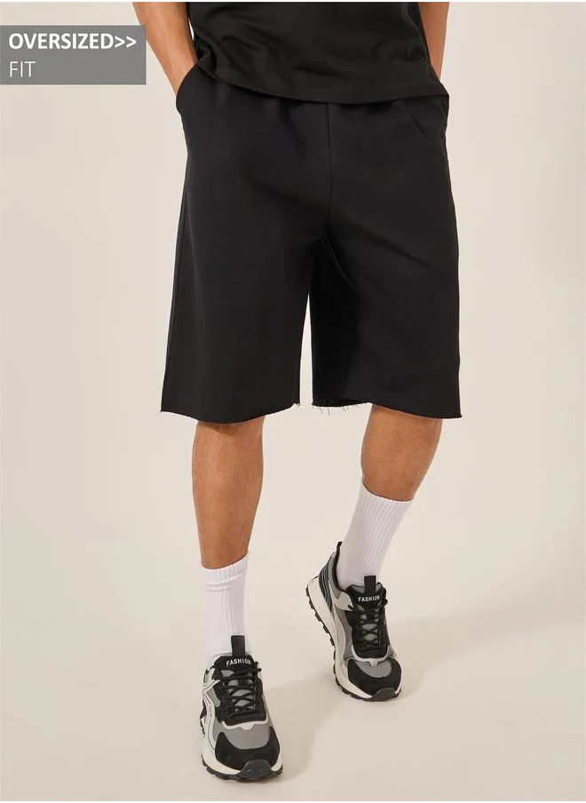Styli Solid Raw Edge Hem Terry Oversized Shorts