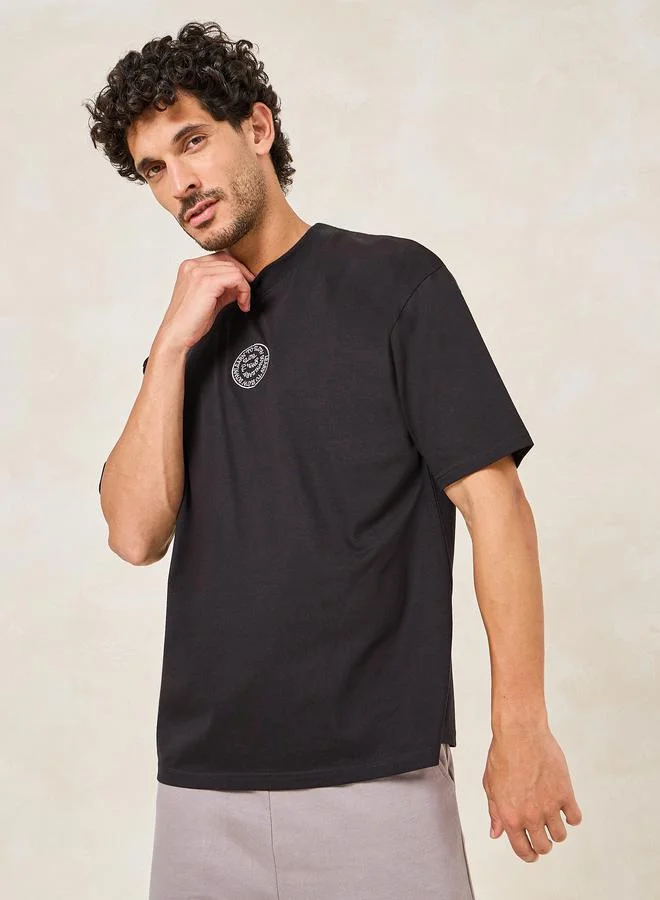 ستايلي Back Printed Oversized Cotton Rich T-Shirt with Mock Neck Detail