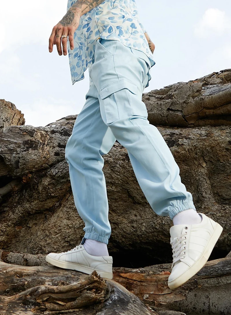 Campus Sutra  Men's Light Blue Cuffed Hem Cargo Trousers for Men | Best Price UAE