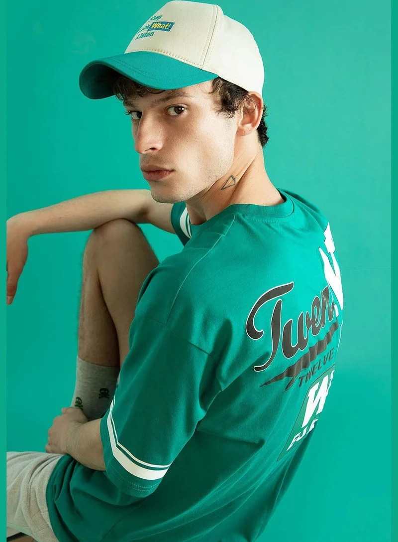 ديفاكتو Minimal Slogan Print Colour Block Baseball Cap
