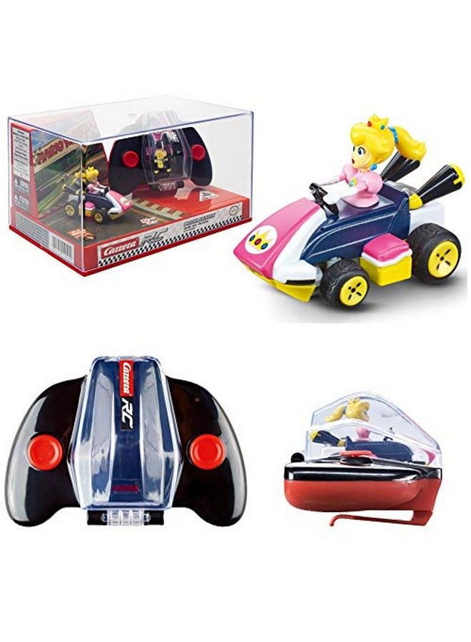 Carrera لعبة سيارة آر سي نينتندو ماريو كارت 2.4 جيجا هرتز صغيرة قابلة للتحصيل بجهاز تحكم عن بعد، سيارة خوخي - Image 1