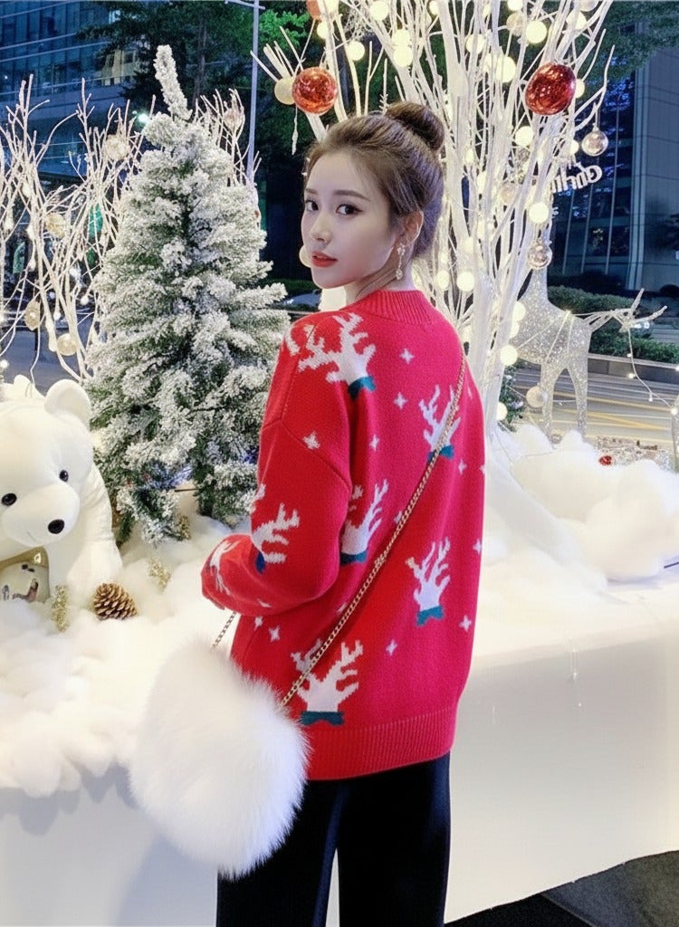 A.M festive Christmas outfit, centered around a vibrant red pullover sweater with a white reindeer and snowflake pattern - Image 2