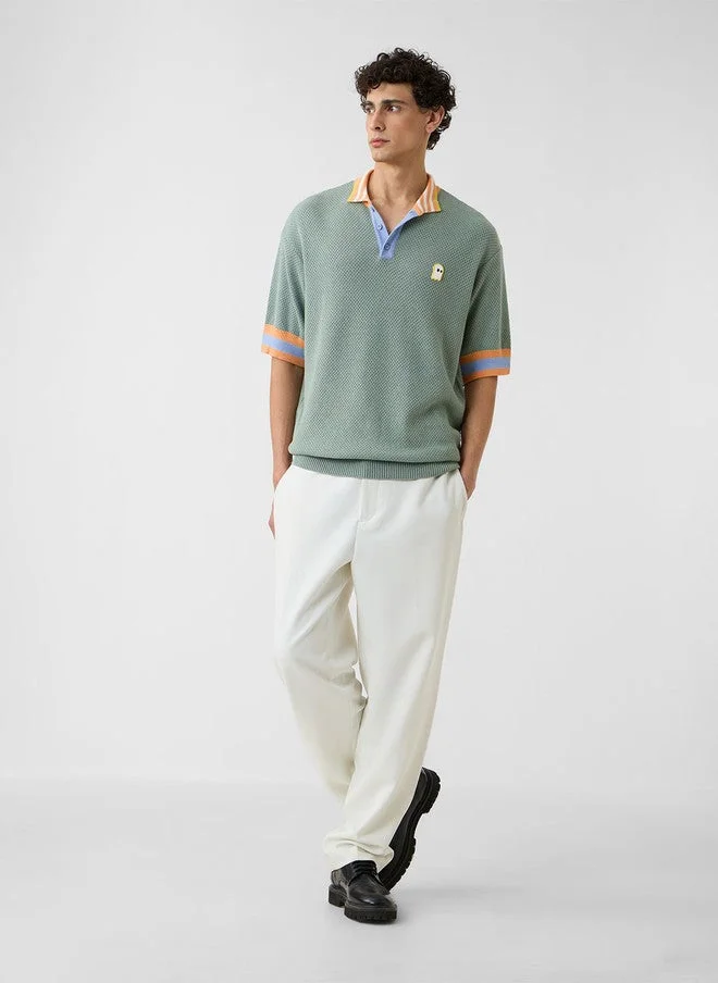 The Souled Store  The Souled Store Men's Oversized Green Polo T-Shirt with Drop-Shoulder Sleeves  | Best Price UAE