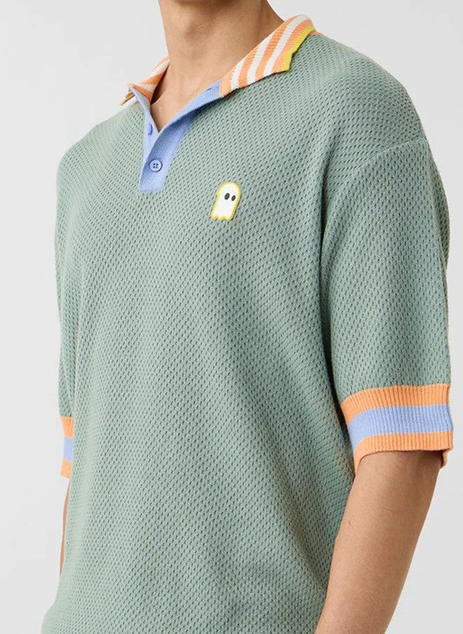 The Souled Store  The Souled Store Men's Oversized Green Polo T-Shirt with Drop-Shoulder Sleeves  | Best Price UAE