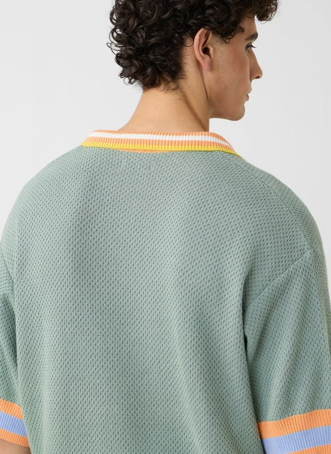 The Souled Store  The Souled Store Men's Oversized Green Polo T-Shirt with Drop-Shoulder Sleeves  | Best Price UAE