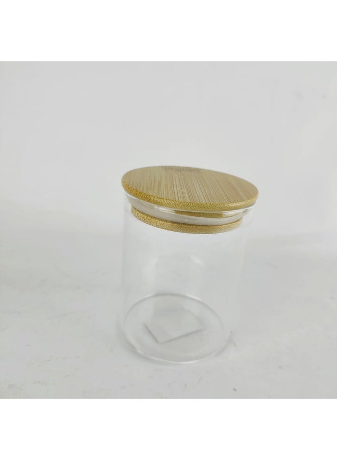 High-quality glass jar with a tightly sealed wooden lid - round - for storing spices and sweets - Image 1
