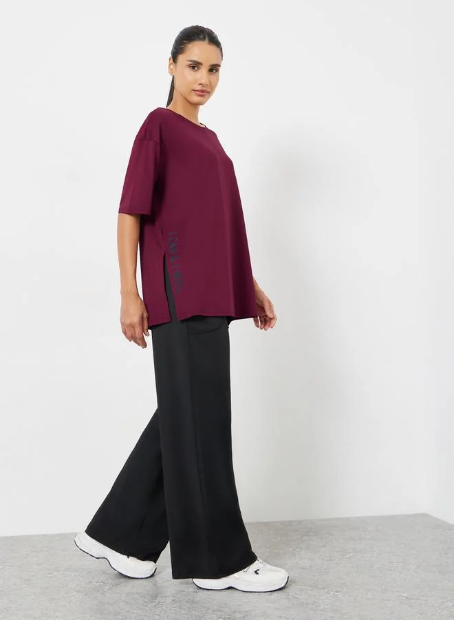 Styli Active Slogan Side Slit Detail Loose Yoga Fit Top