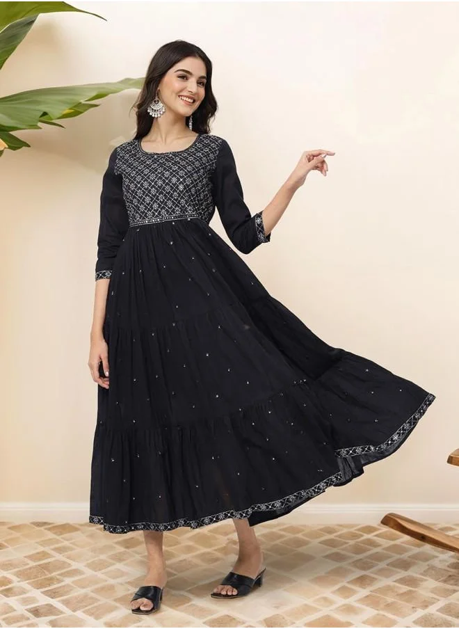 آي شين Three-Fourth Sleeve Women Black Cotton Dress with Embroidered pattern and features a Round neckline and Three-Fourth Sleeve secured with closure and styled in Straight Fit ideal for Festive moments — designed to make heads turn.