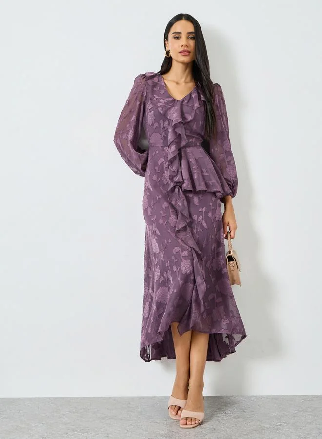 ستايلي فستان طويل أرجواني بأكمام طويلة وتفاصيل كشكش