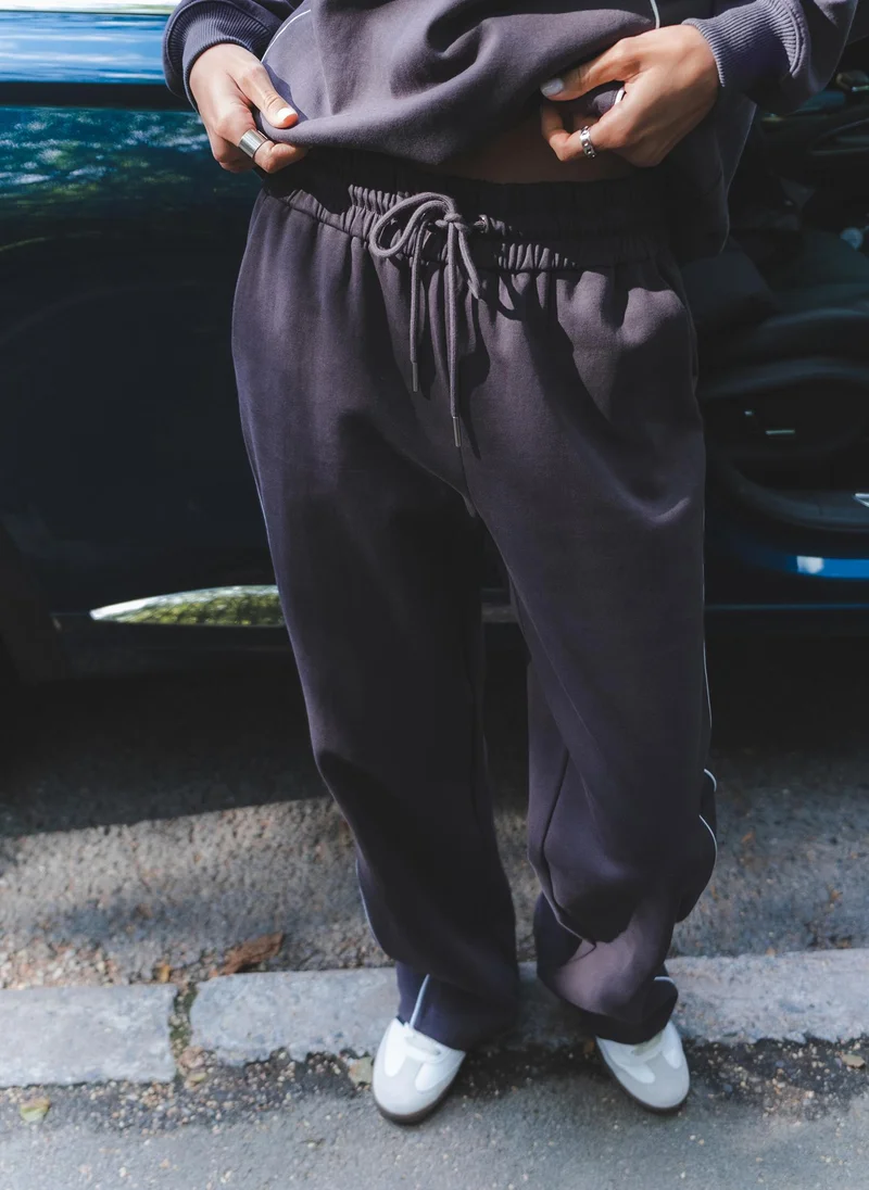 Lichi  Jersey trousers with contrasting stripes for Women | Best Price UAE