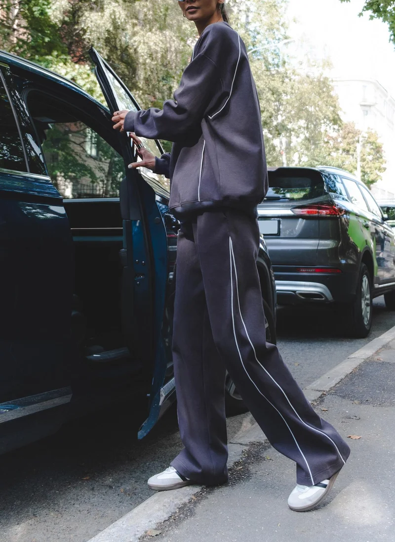 Lichi  Jersey trousers with contrasting stripes for Women | Best Price UAE