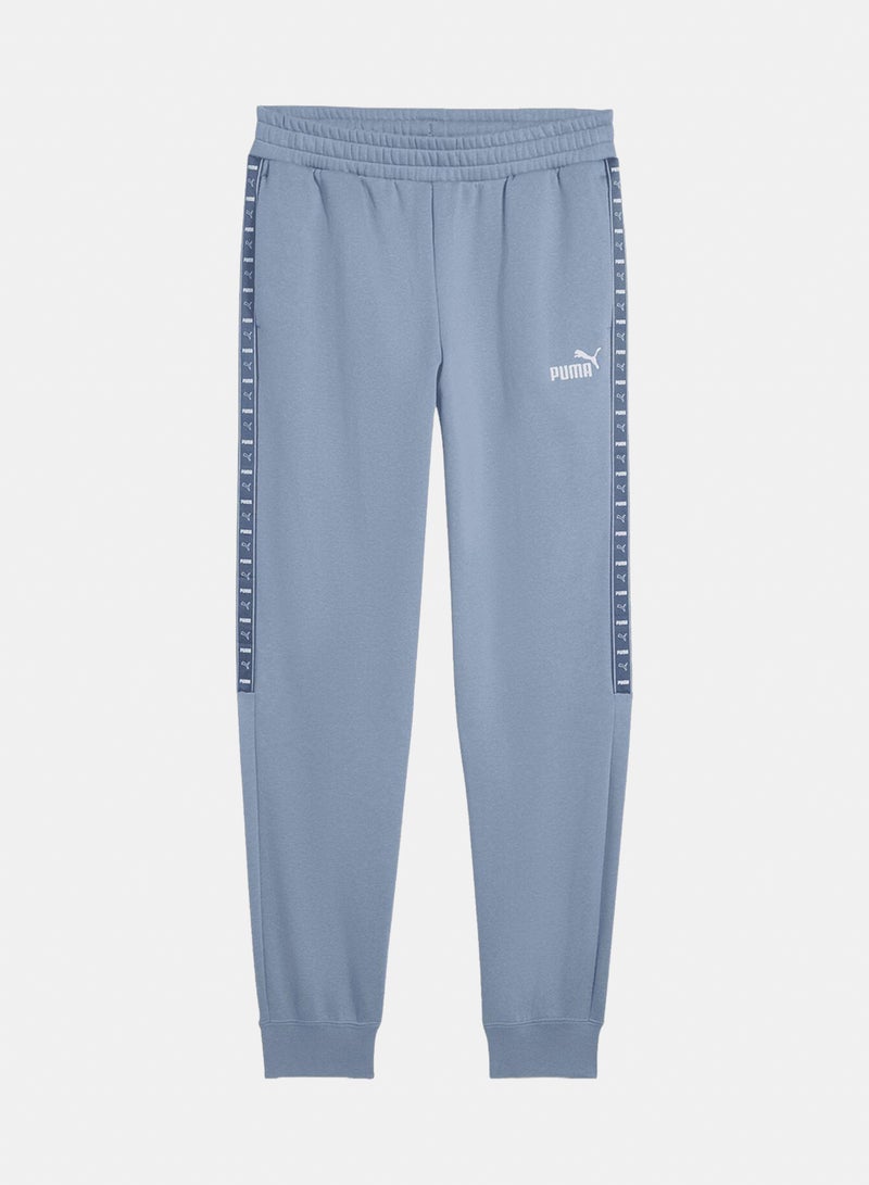 PUMA ESS TAPE Sweatpants - Image 1