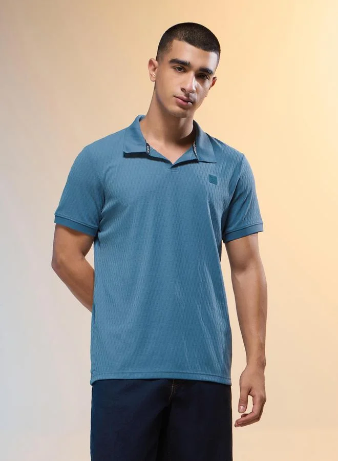 تكنوسبورت تيشيرت بولو رجالي بقصة ضيقة بنقشة الجاكار من تكنوسبورت