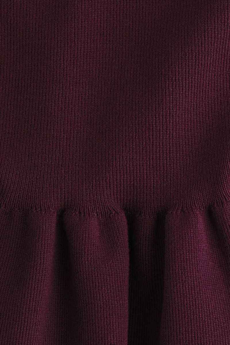 اتش اند ام بلوزة محبوكة بحواف بيبلوم