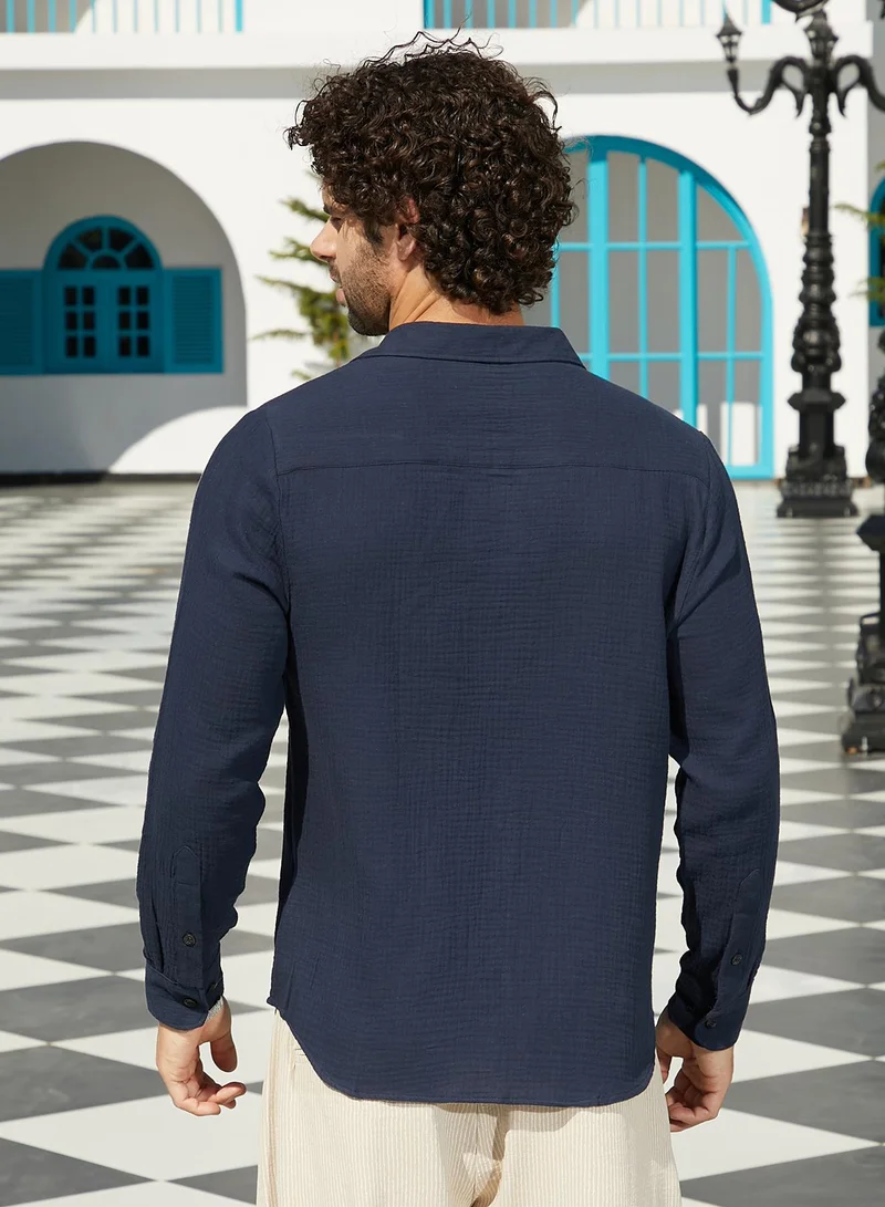 Campus Sutra Campus Sutra Men's Prussian Blue Breezy-Weave Shirt For Casual Wear | Spread Collar | Long Cuffed Sleeves | Button Closure | Shirt Crafted With Comfort Fit For Everyday Wear