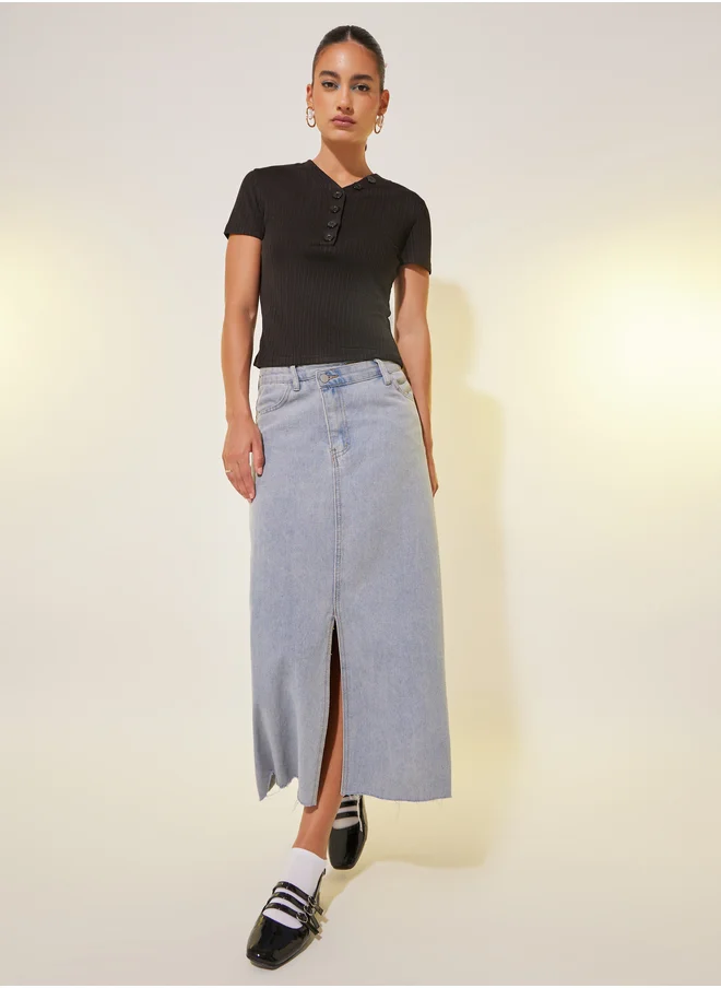 ستايلي Solid Textured V-Neck Buttoned Top